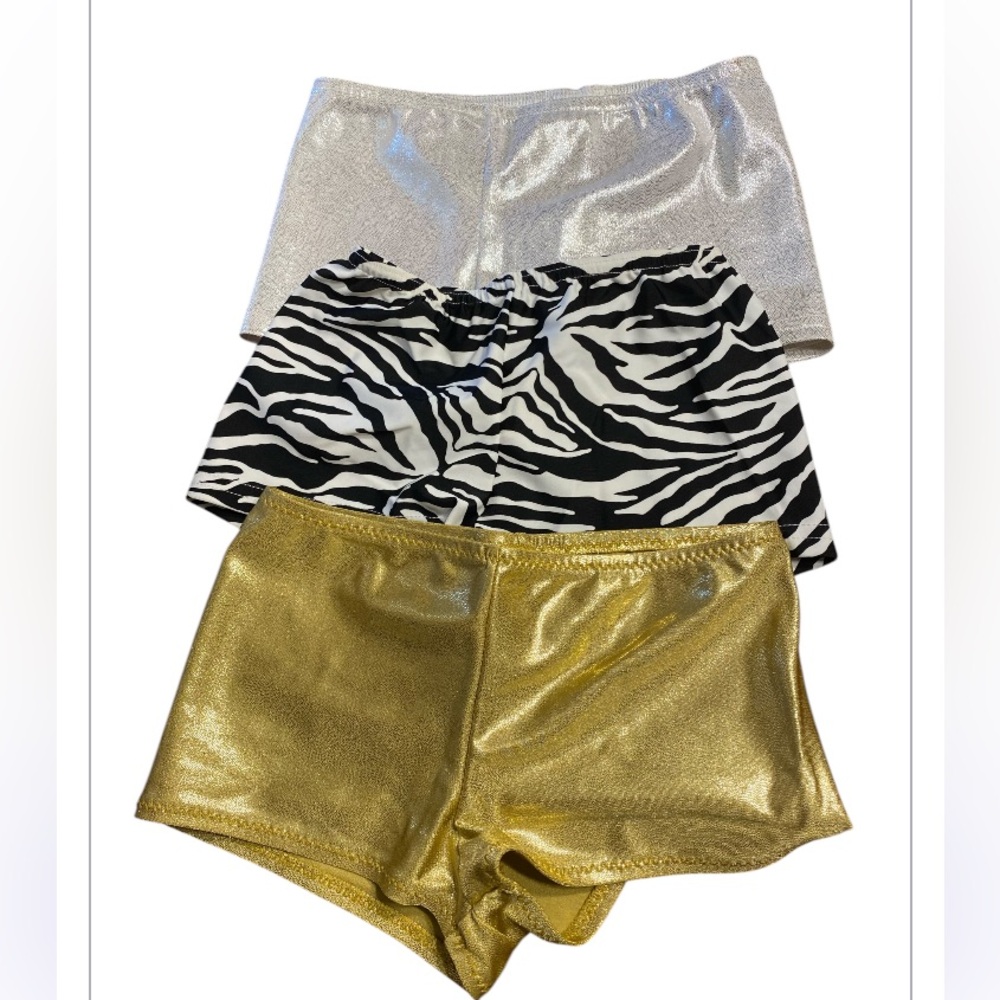 Dance, gymnastics or cheer shorts.  Youth size small.  Three pair included.